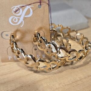 All the Heart Eyes gold hoops by Plunder.